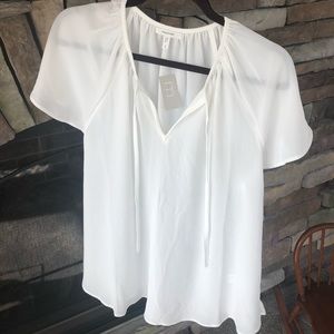 Semi-sheer white blouse